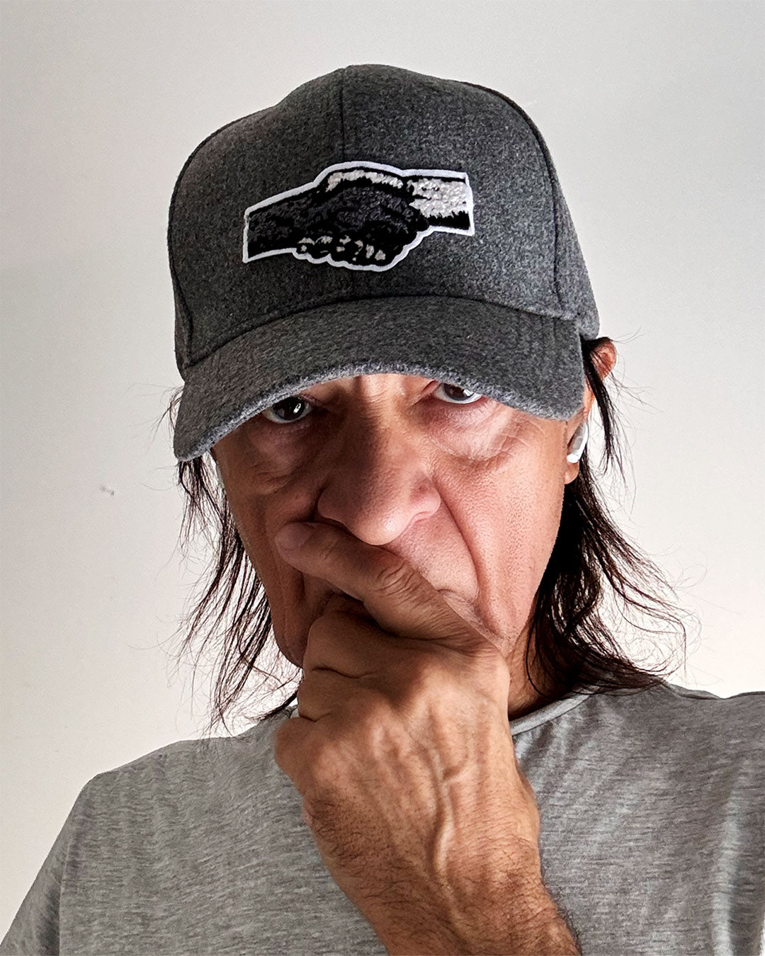 Handclasp Emblem embroidery detail on cashmere cap — Free Agent N.Y.