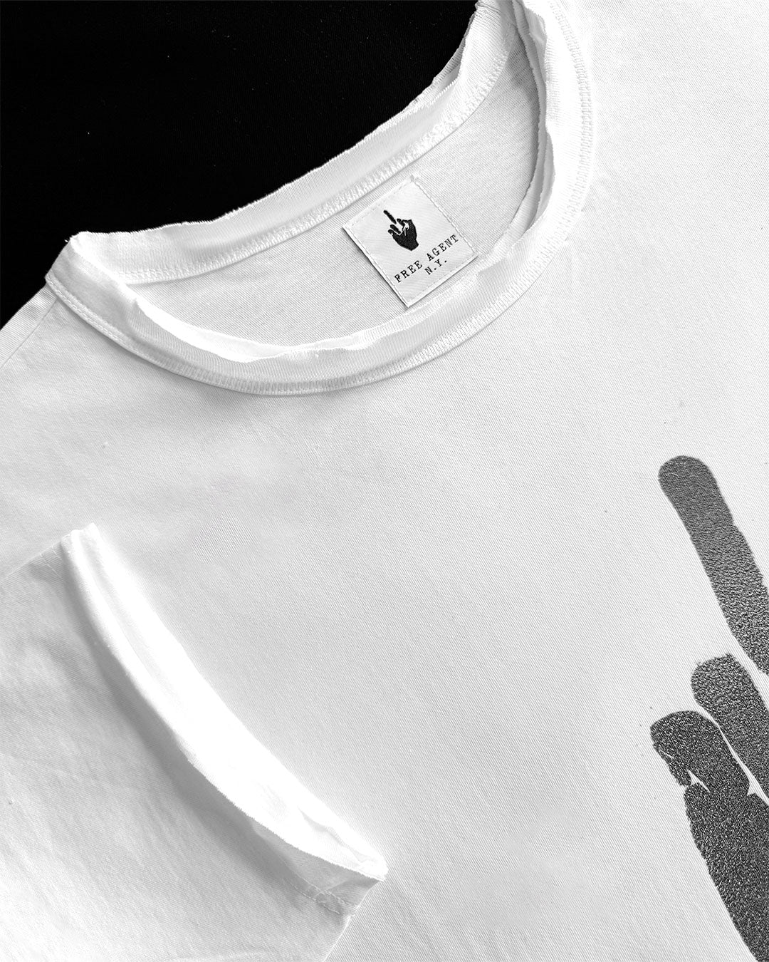 Detail from Free Agent N.Y.® Signature "FINGER" oversized, raw-edge T-Shirt 